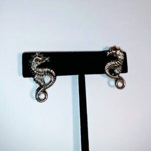 Vintage beau sterling sea horse screw back earrings.